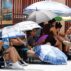 People take shelter from the heat in Spain, on 12 July 2023.
